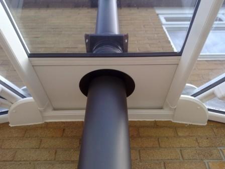 flue through conservatory roof